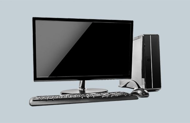 A black desktop computer with a grey background.